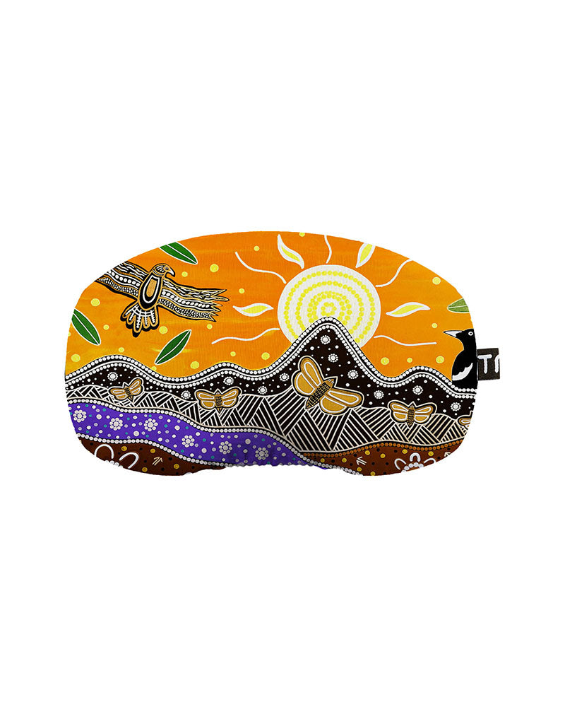 XTM goggle protector with an orange, purple and brown Indigenous design of a sun, mountains and butterflies