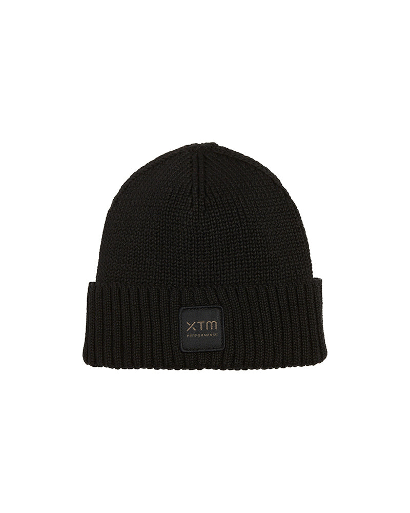 Black XTM Kids Hangout Polylana Eco Beanie in rib knit with folded hem and tonal XTM badge