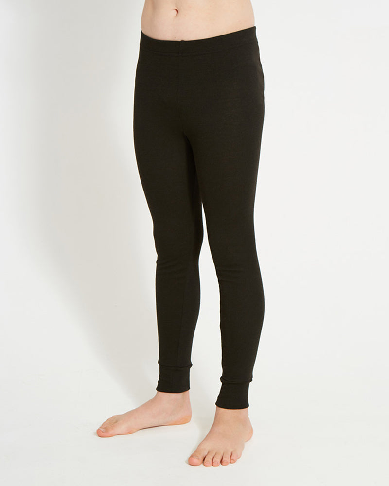 XTM Kids Heatflex Thermal Pant in Black, three-quarter front view