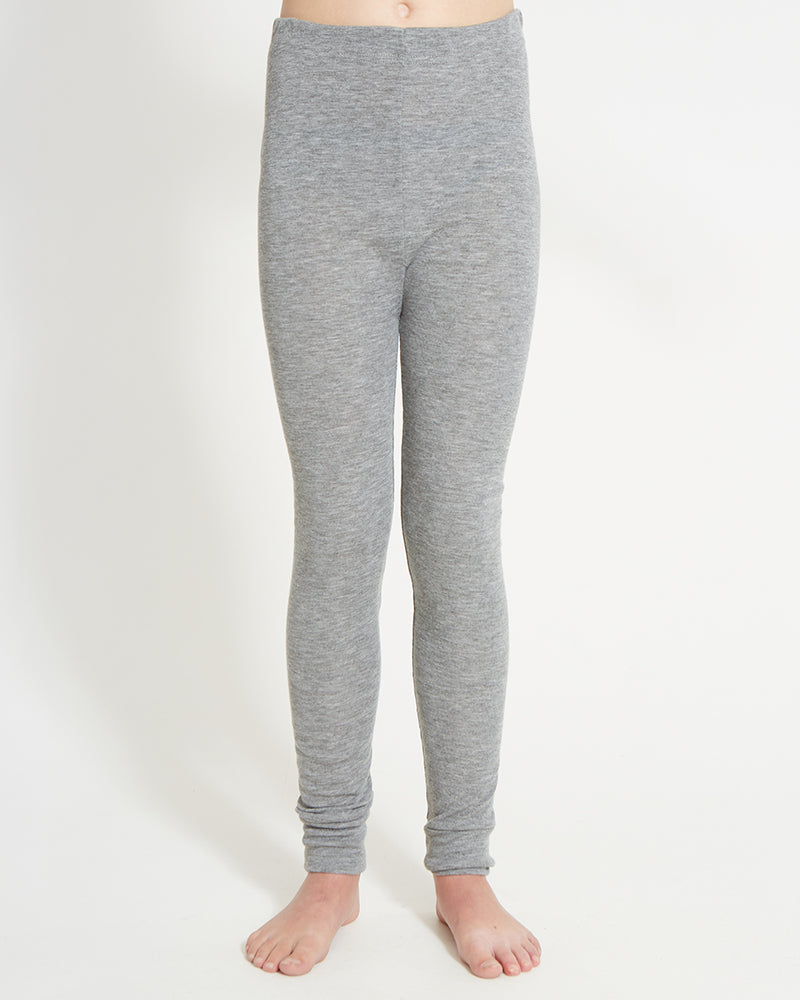 XTM Kids Heatflex Thermal Pant in Charcoal Marle, front view on a child