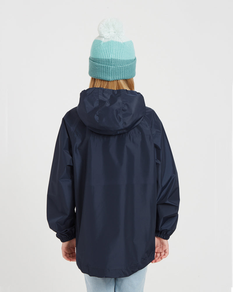 Back view of the XTM Kids Stash 2L rain jacket in Patriot Blue with the hood down