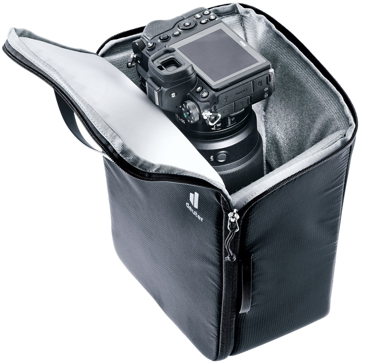 Deuter Camera Box One, side view with the lid open and a camera with lens inside