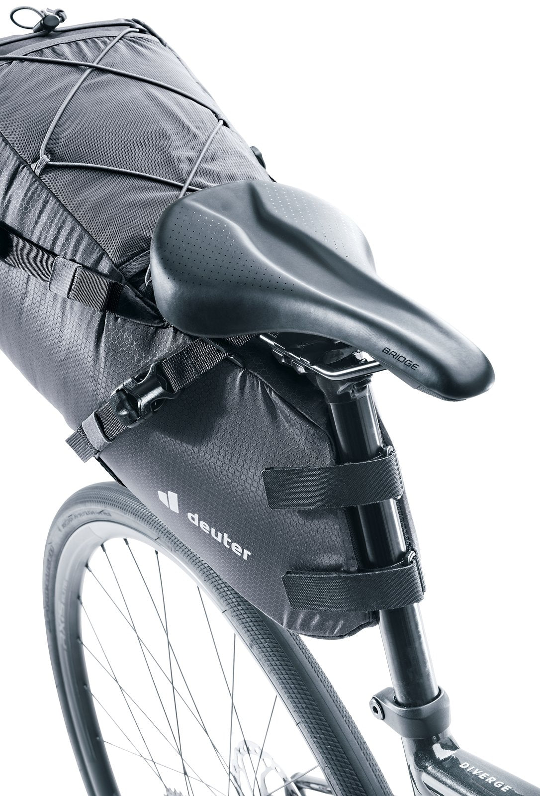 Deuter Mondego SB 16 straps wrapped around a seat post under the saddle