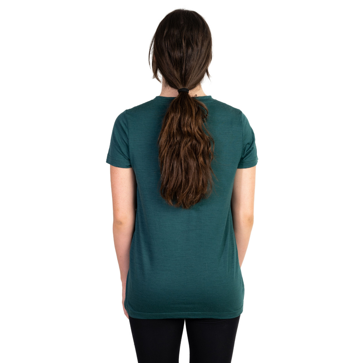 Back shot of Ottie Merino women's Otway Fern short sleeve merino wool t-shirt on 166cm model who is wearing a size small