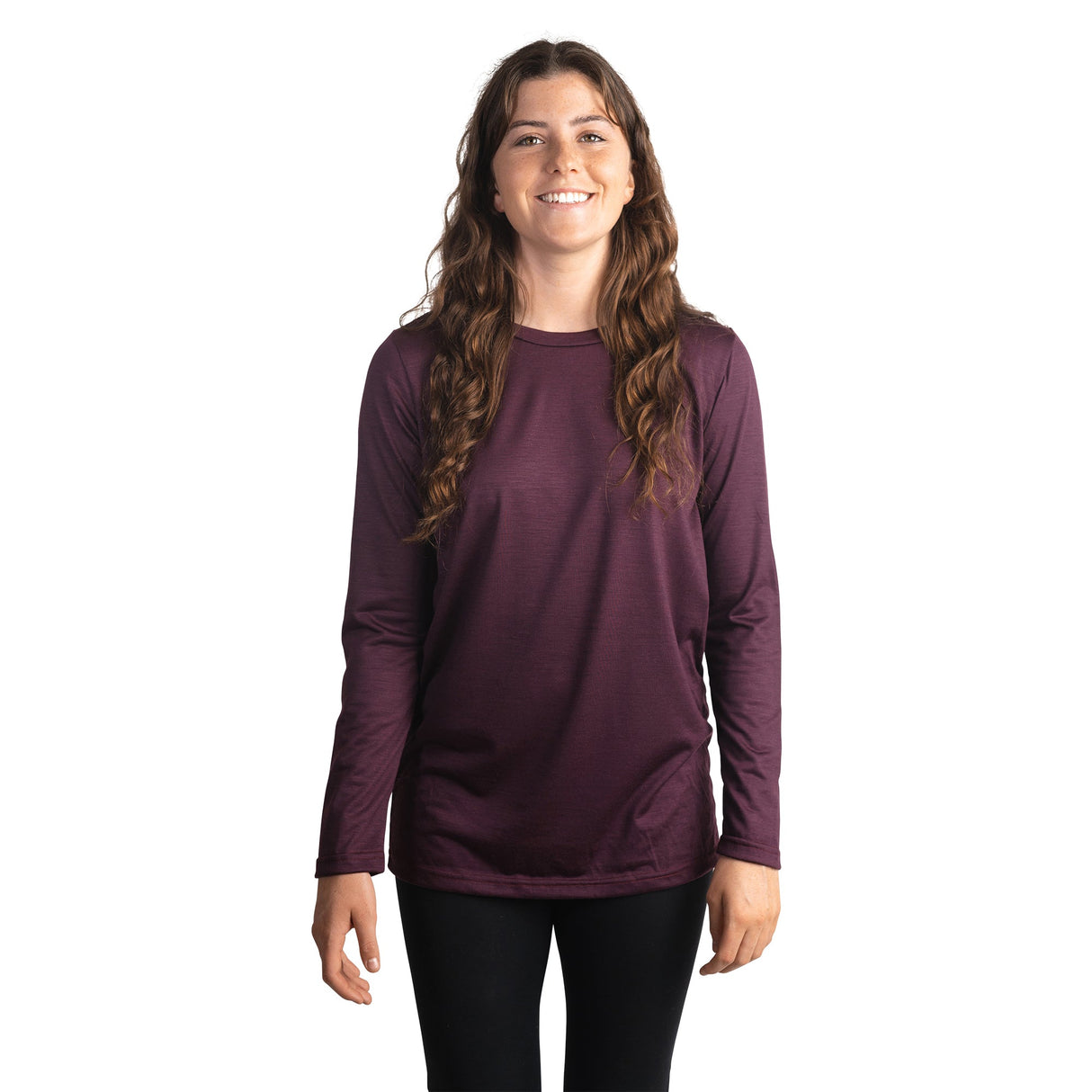 Front shot of Ottie Merino women's Plum long sleeve merino wool t-shirt on 166cm model who is wearing a size small