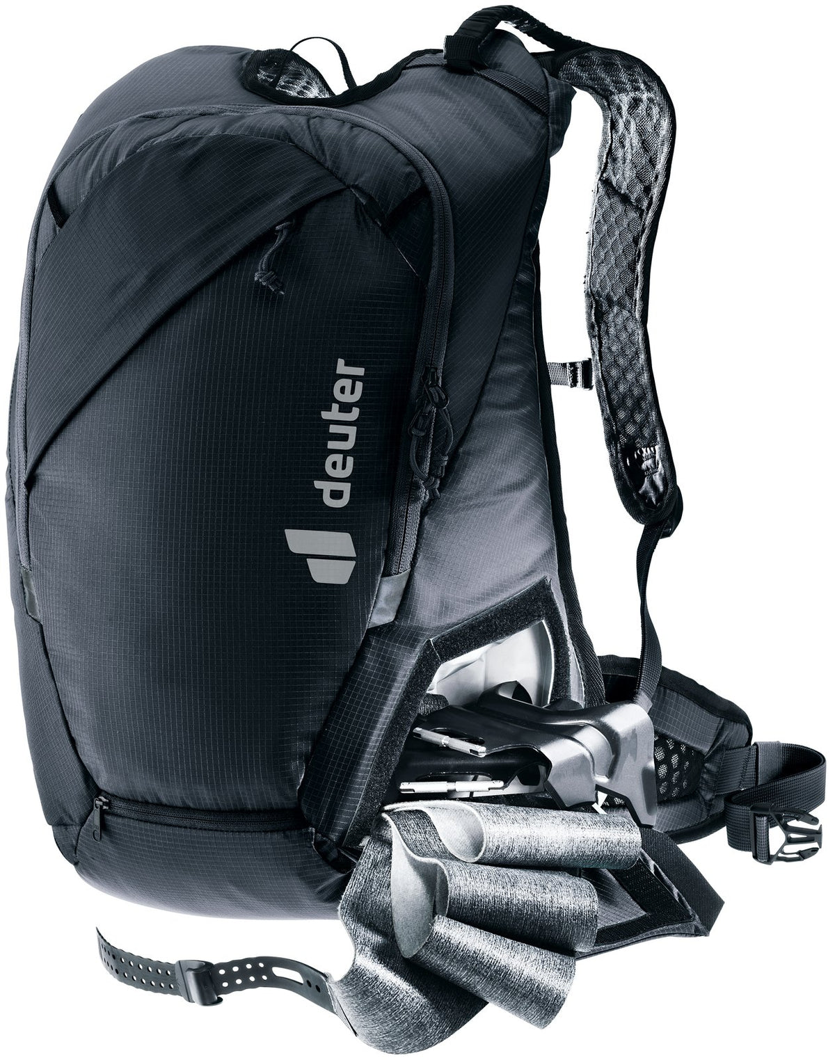 Deuter Updays 20 with skins and crampons pulled from the bottom compartment