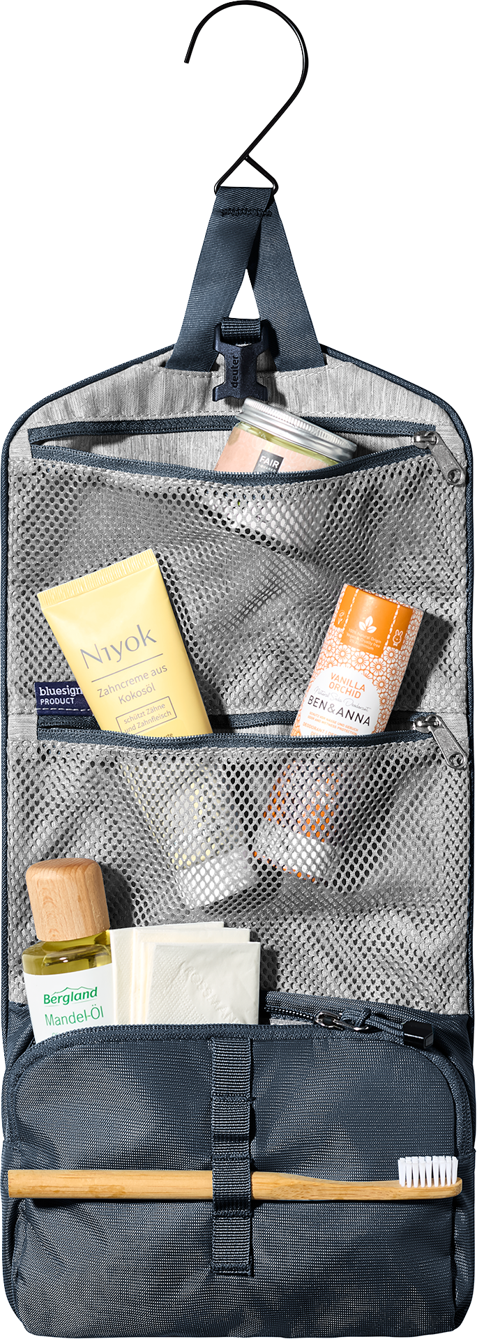 Deuter Wash Bag I in Black hanging open from its hook, showing toiletries in the mesh pockets