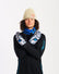 Snowboarder in a beanie crossing his arms wearing XTM Valentino Ascent Snow Leopard mitts