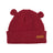XTM Bugaboo infant beanie in Berry, a raspberry red rib knit with two little ears and a leather XTM badge