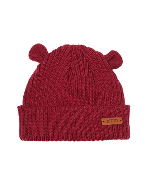 XTM Bugaboo infant beanie in Berry, a raspberry red rib knit with two little ears and a leather XTM badge