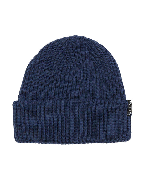 Indigo XTM Kids Slushy Beanie in mid blue rib knit with double-walled cuff and black woven label