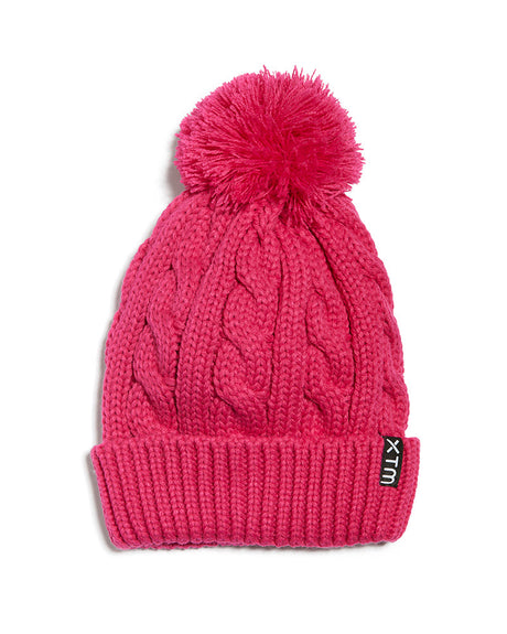 Magenta XTM Kids Daydream Beanie in bright pink cable knit with pom pom and woven XTM label