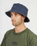 Man wearing the Indigo XTM Sundew hemp-cotton bucket hat, three-quarter view