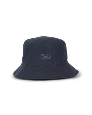 XTM Sundew bucket hat in Indigo navy with a tonal embroidered XTM logo, product shot