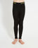 XTM Kids Alpine230 Merino Thermal Pants in Black, front view showing the yellow XTM jacquard waistband