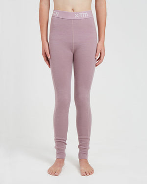XTM Kids Alpine230 Merino Thermal Pants in Fog, a dusty mauve, front view on a child