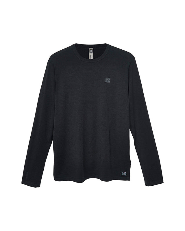 XTM Adventure170 merino long sleeve thermal in black, laid flat, front view with chest logo