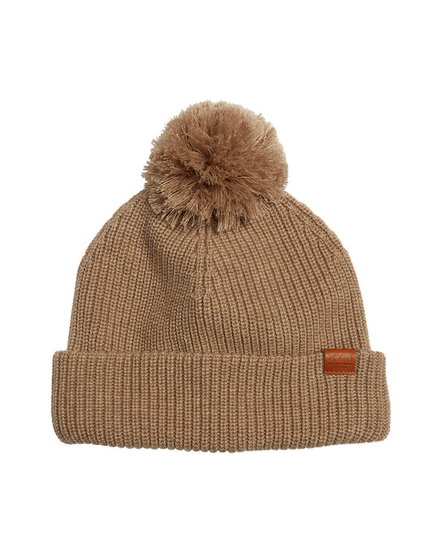 Taupe XTM Dandy merino wool blend beanie with matching yarn pom pom, folded cuff and leather badge