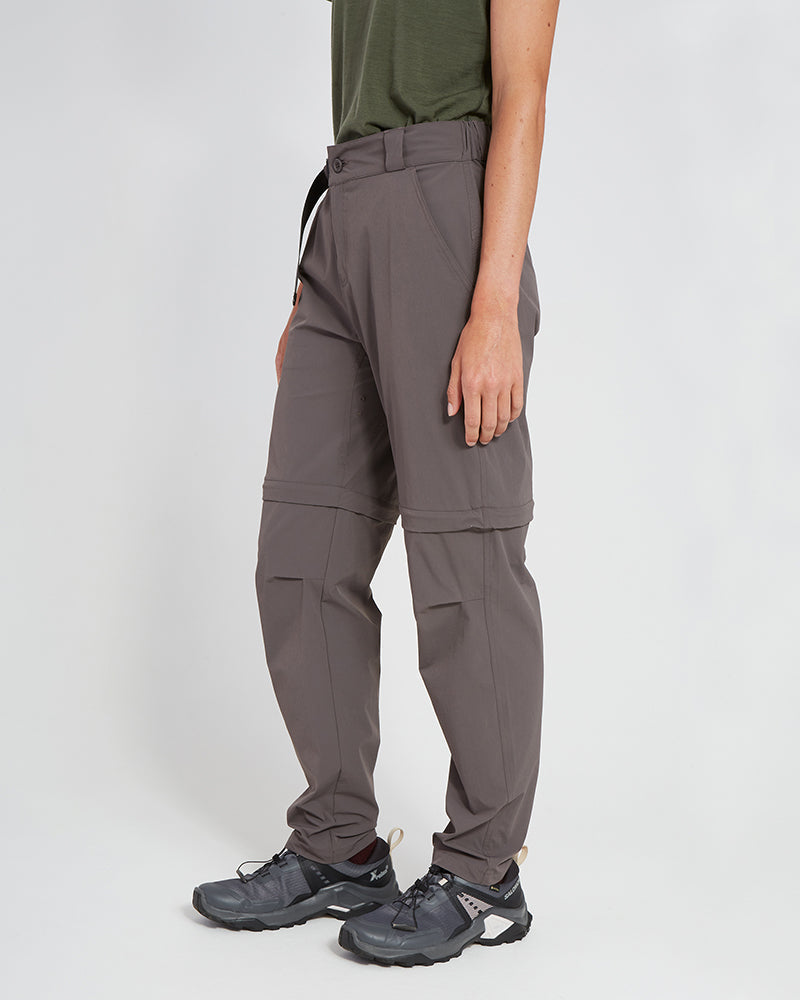 XTM Wye River hiking pants in Pavement, side view full length with tapered leg and knee zip