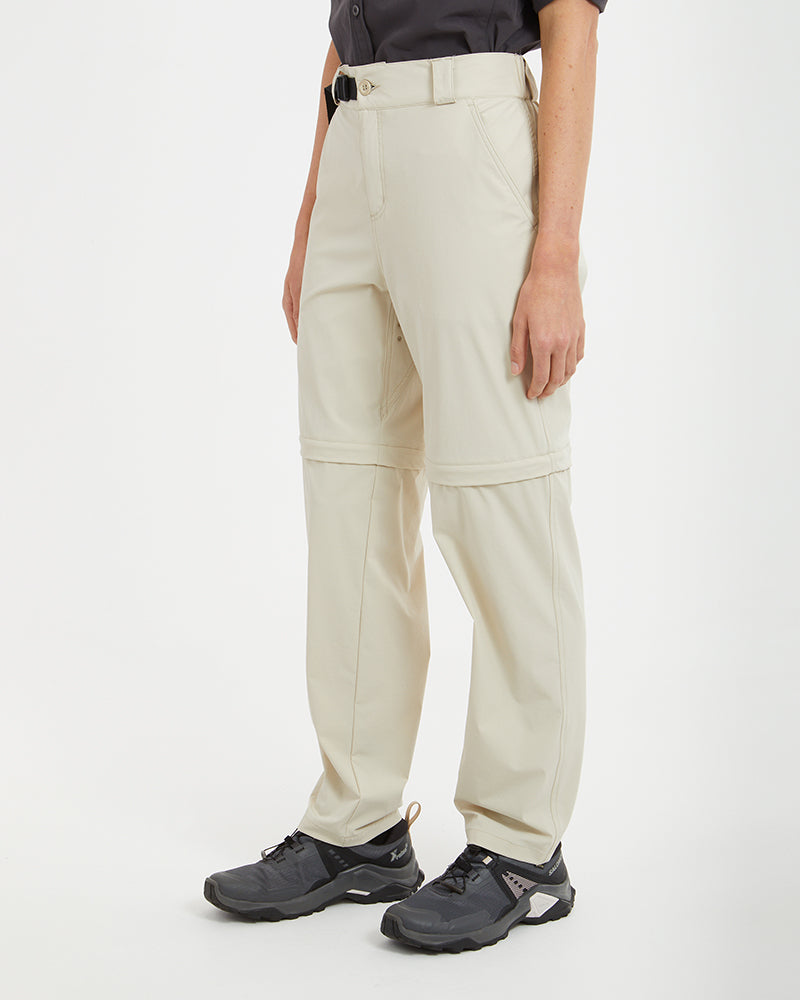 XTM Wye River Sand hiking pants three-quarter view showing the zip-off seam above the knee