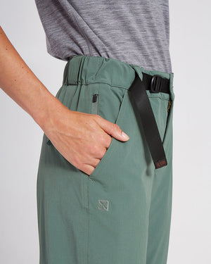XTM Wye River Spruce Green hiking pants hip close-up with hand in pocket and black belt
