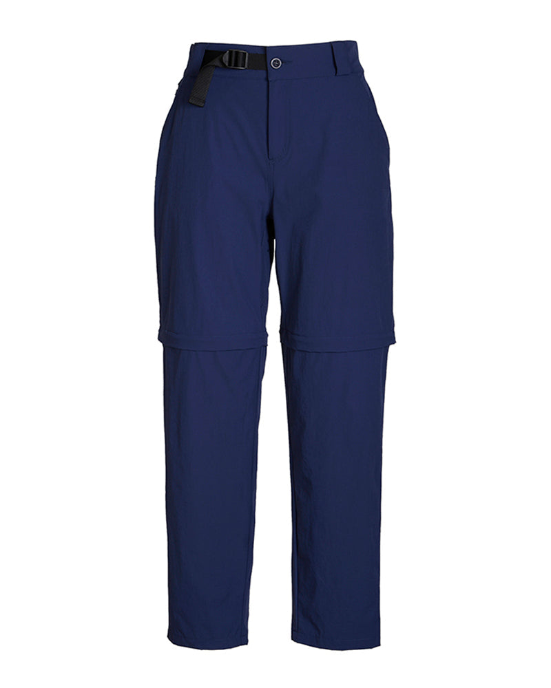 XTM Wye River zip-off hiking pant in Naval Blue laid flat, full length with belt and knee zip seam