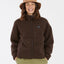 Woman wearing XTM Banksia sherpa fleece jacket in Java chocolate brown with bucket hat, front view