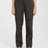 Woman wearing XTM Acacia hiking pants in Pirate Black with belt and leg flap pockets, front view