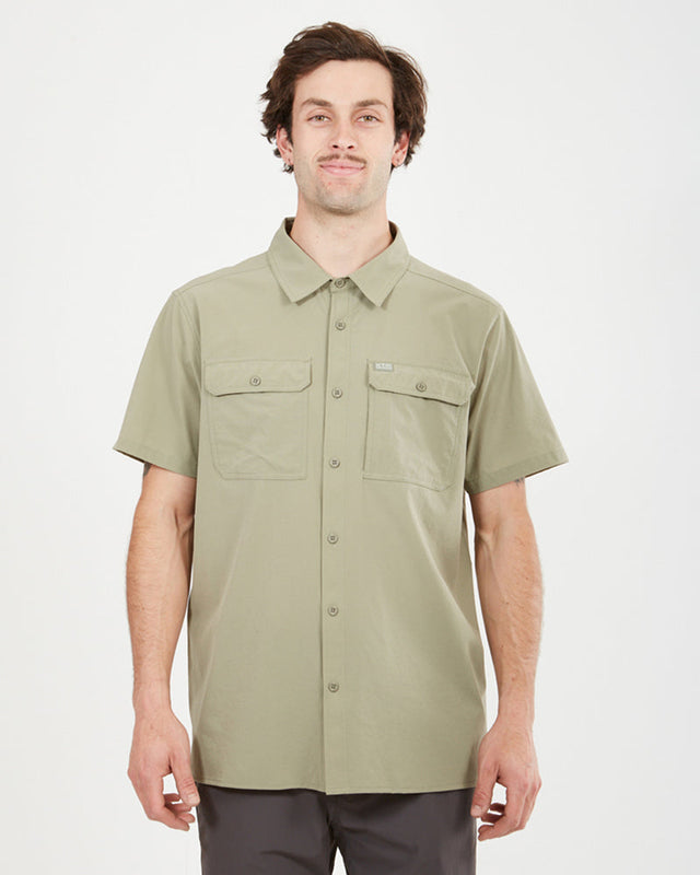 Man wearing the XTM Dunkeld short sleeve hiking shirt in Light Khaki, front view