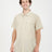 Man wearing the XTM Dunkeld short sleeve hiking shirt in Sand, front view