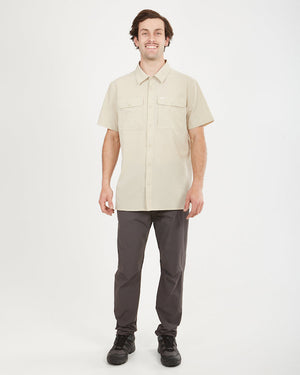 Full-length view of a man in the Sand XTM Dunkeld short sleeve shirt