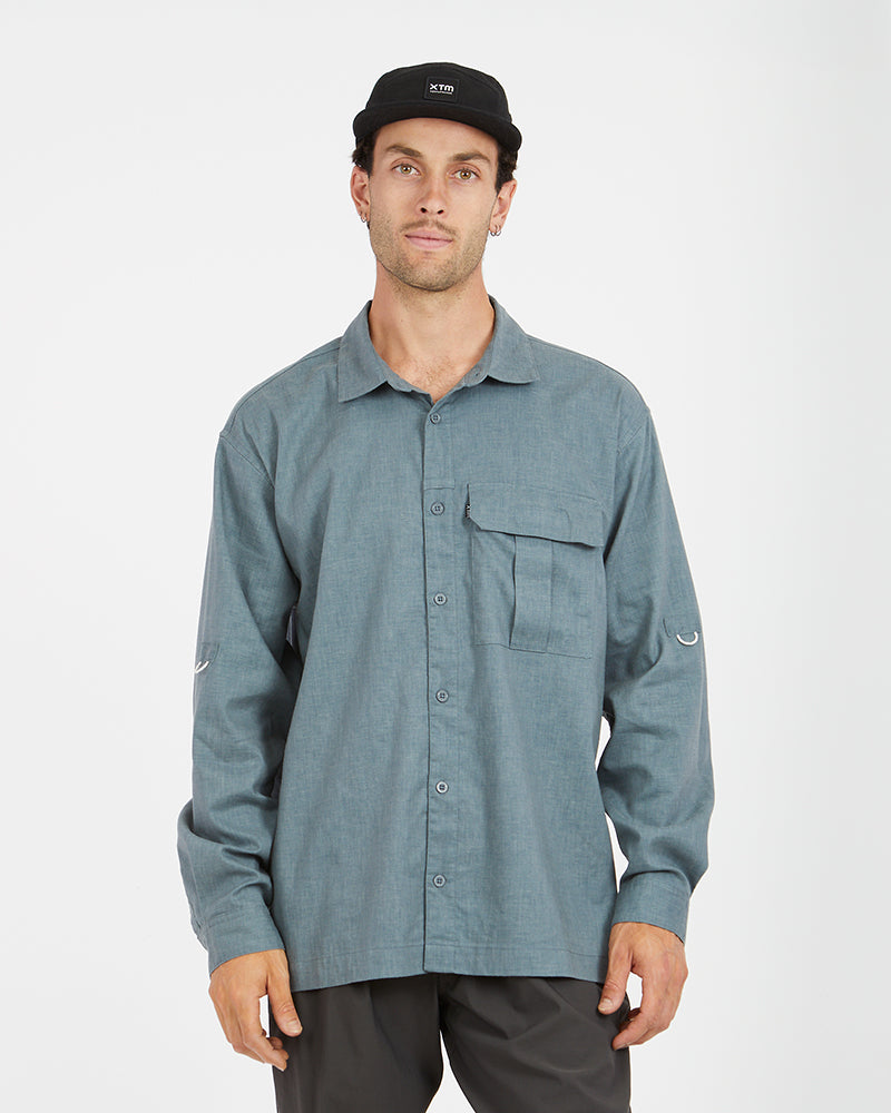 Man in a black cap wearing the XTM Messmate hemp blend shirt in Basalt, front view
