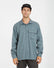 Man in a black cap wearing the XTM Messmate hemp blend shirt in Basalt, front view