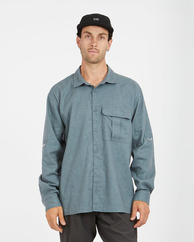 Man in a black cap wearing the XTM Messmate hemp blend shirt in Basalt, front view