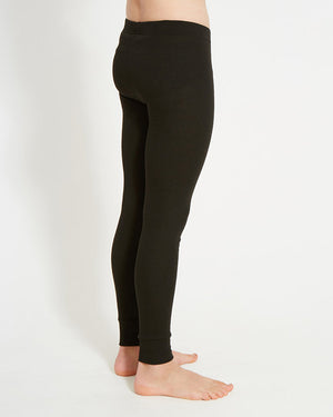 XTM Kids Heatflex Thermal Pant in Black, side view showing the slim leg