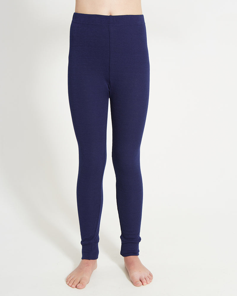 XTM Kids Heatflex Thermal Pant in Navy, front view on a child