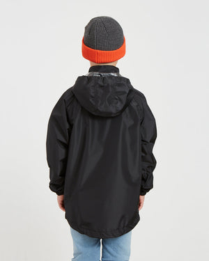 Back view of the XTM Kids Stash 2L rain jacket in Black with the hood down