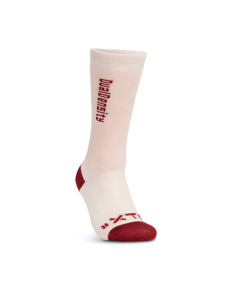 XTM Kids Dual Density sock in Soft Pink, side view with the Dual Density logo on the leg