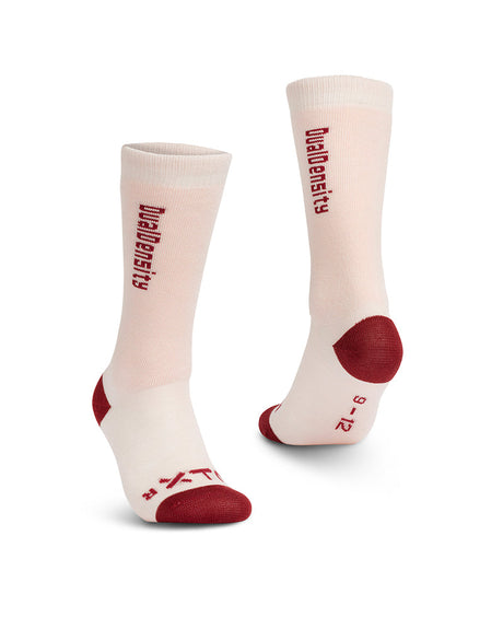 Pair of XTM Kids Dual Density snow socks in Soft Pink with burgundy heel and toe