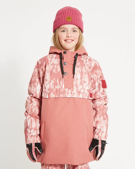 Girl wearing the Dusty Pink Soft Camo XTM Kids Riley Ski Jacket Anorak, front view, hood down