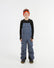 XTM Kids Bailey Ski Pant in Indigo Solid, front view on a child showing the chest panel