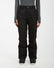 Front view of the black XTM Smooch women's ski pants with snap waist and side pockets