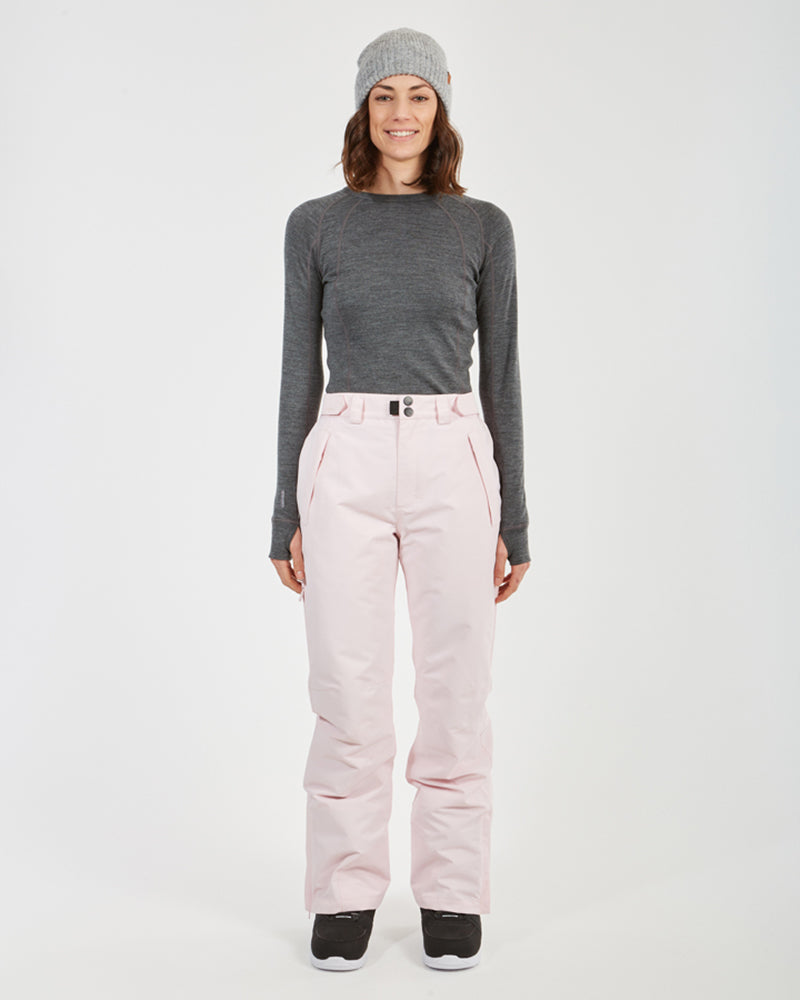 Woman wearing the Blossom XTM Smooch ski pants and grey beanie, full-length front view