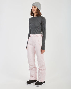 Three-quarter full-length view of a woman in the Blossom XTM Smooch ski pants