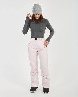 Woman in the Blossom XTM Smooch ski pants touching her beanie, front view