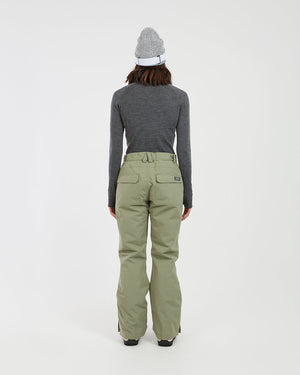 Back view of a woman in the Light Khaki XTM Smooch ski pants