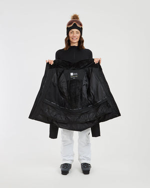 Black XTM Solace jacket held open to show the plush lining and powder skirt