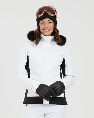 XTM Solace women's ski jacket in white with black side panels and black faux fur trim
