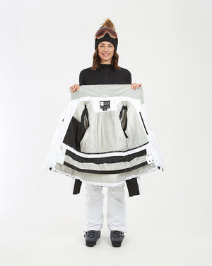 White XTM Solace jacket held open to show the grey plush lining and powder skirt