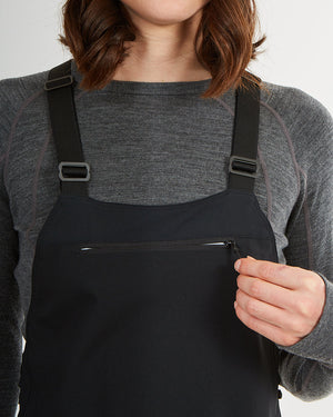 Close-up of the zipped chest pocket and suspenders on the black XTM Stellar 2.0